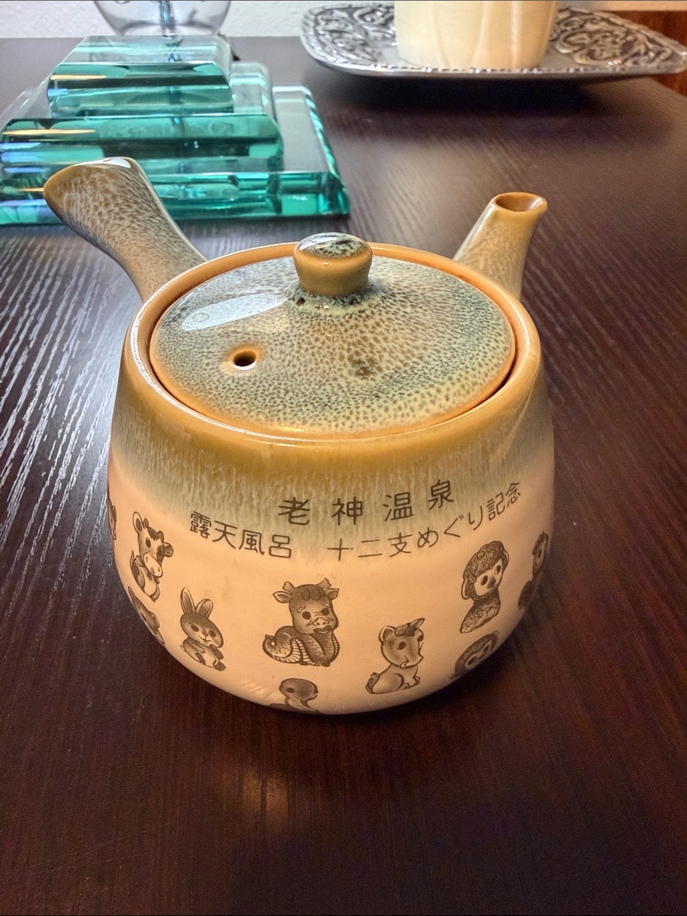 Japanese Kyusu Teapot Featuring A Side Handle And A Blue-Glazed Lid.